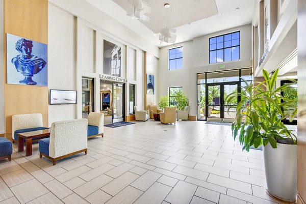 Modern clubhouse with entertainment options at Tapestry Largo Station Apartments, ideal for social gatherings