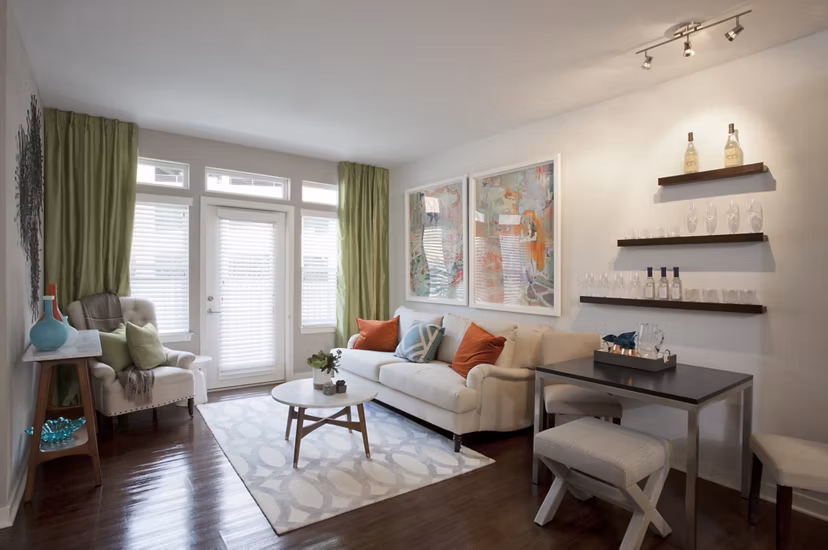 Spacious living room with modern decor at Tapestry Largo Station Apartments