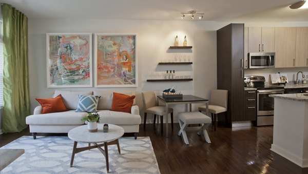 Stylish living room with modern furnishings at Tapestry Largo Station Apartments, showcasing luxury urban living
