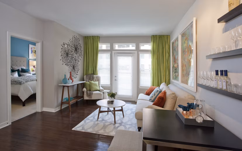 Modern living room with stylish furnishings at Tapestry Largo Station Apartments, highlighting comfort and luxury living in a serene environment