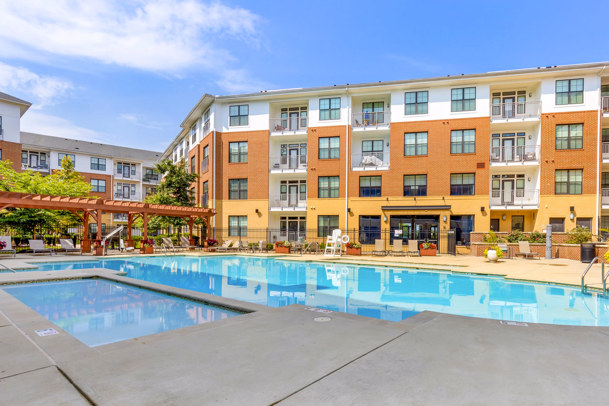 Resort-style pool at Tapestry Largo Station Apartments offering relaxation and leisure amenities