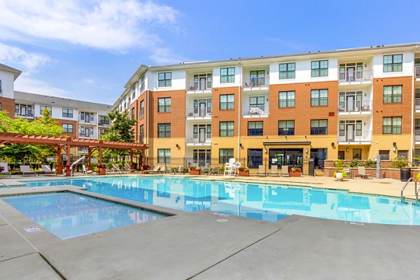 Resort-style pool at Tapestry Largo Station Apartments offering relaxation and leisure amenities