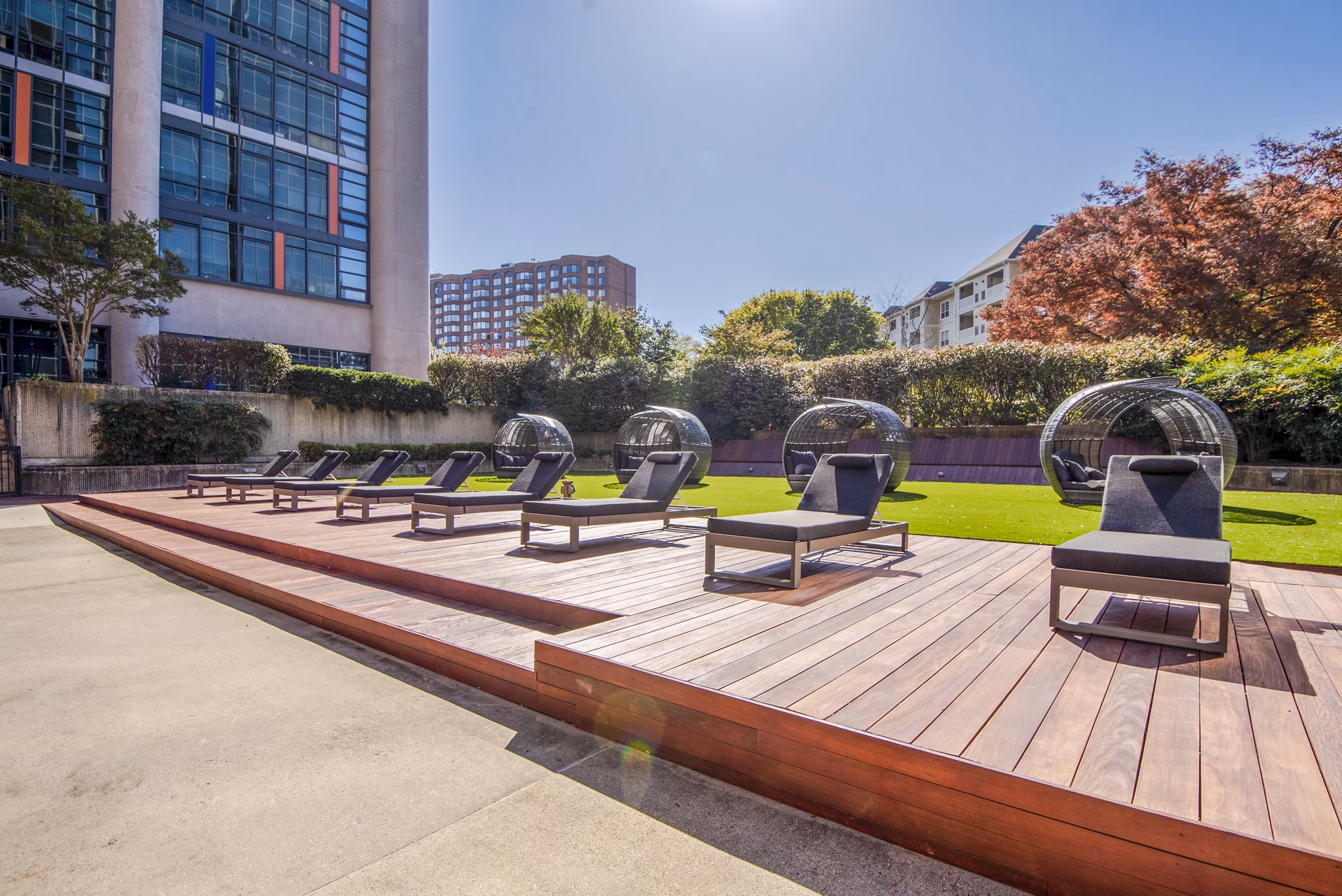 Spacious patio with modern seating at Elofts Apartments, ideal for outdoor relaxation