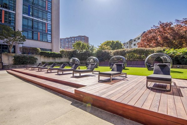 Spacious patio with modern seating at Elofts Apartments, ideal for outdoor relaxation