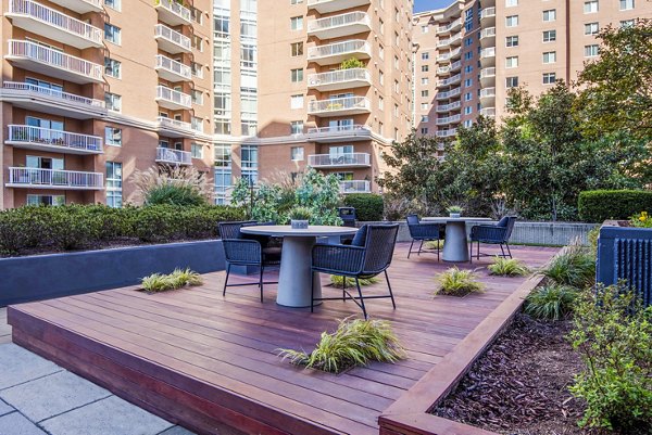 Spacious outdoor patio with modern seating at Elofts Apartments, perfect for relaxation and socializing