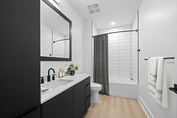 Modern bathroom featuring sleek fixtures at Elan LoSo Apartments