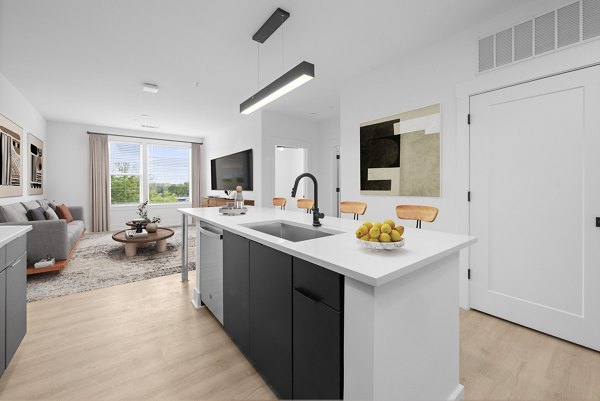 Modern kitchen featuring stainless steel appliances at Elan LoSo Apartments