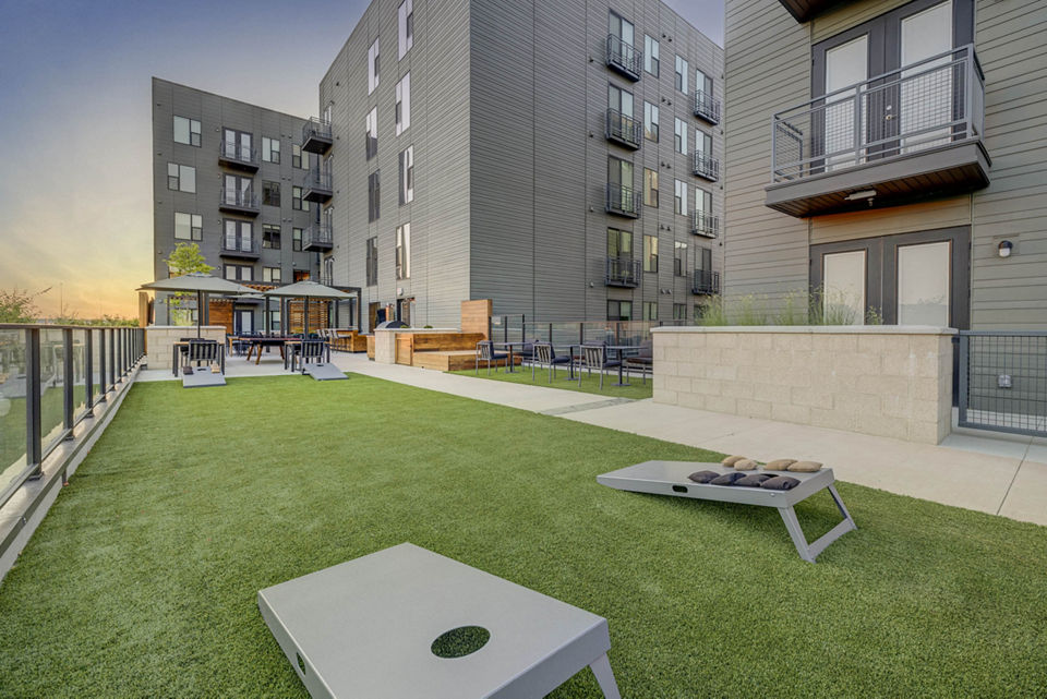 Playground with modern equipment at CINQ Apartments