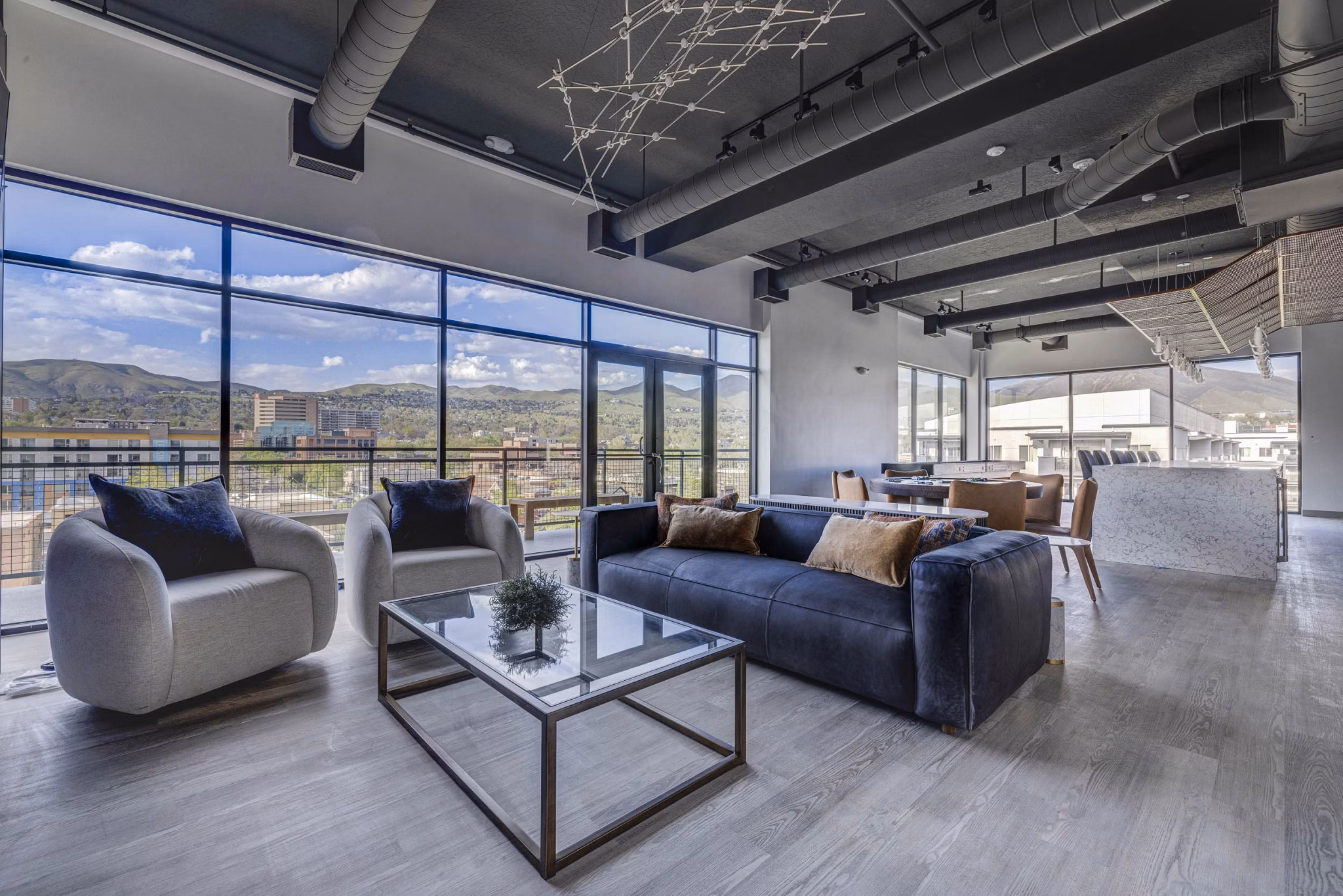 Clubhouse featuring elegant lounge seating and modern decor at The DeWitt Apartments in Chicago