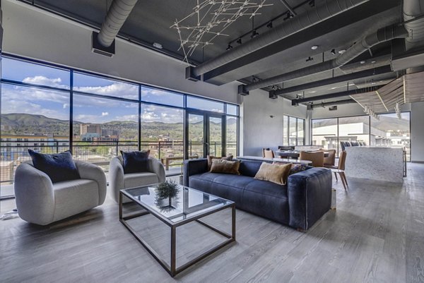 Clubhouse featuring elegant lounge seating and modern decor at The DeWitt Apartments in Chicago