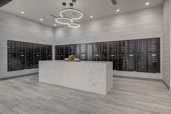 Efficient mailroom with organized parcel lockers at The DeWitt Apartments