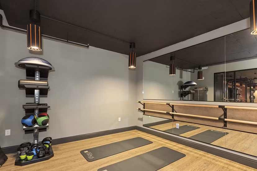 fitness center at Enclave at Radius Dilworth Apartments 