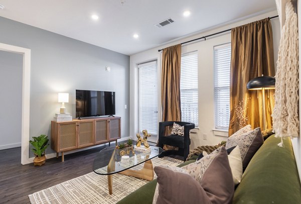 living room at Enclave at Radius Dilworth Apartments