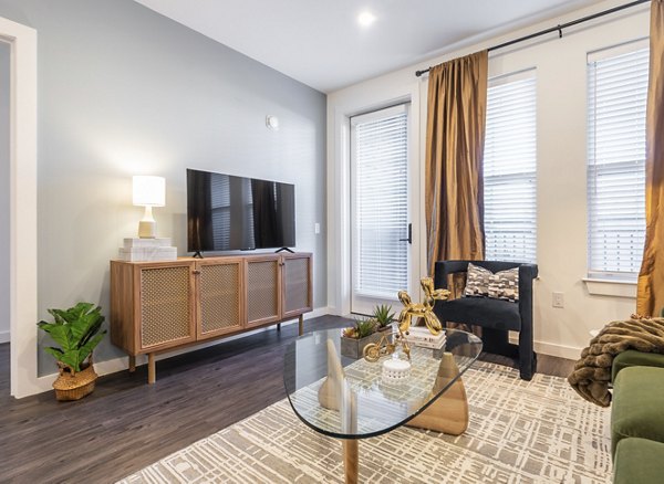 living room at Enclave at Radius Dilworth Apartments