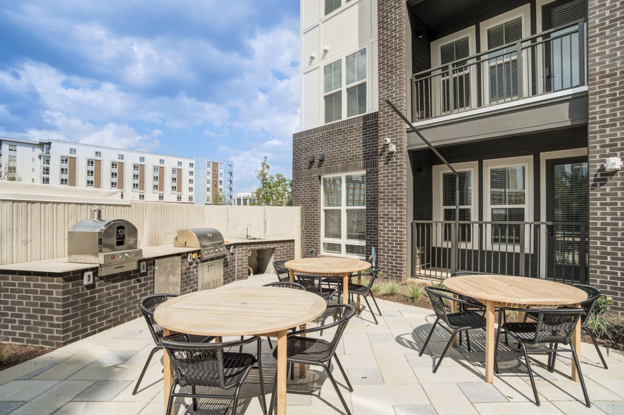 Grill area at Enclave At Radius Dilworth Apartments