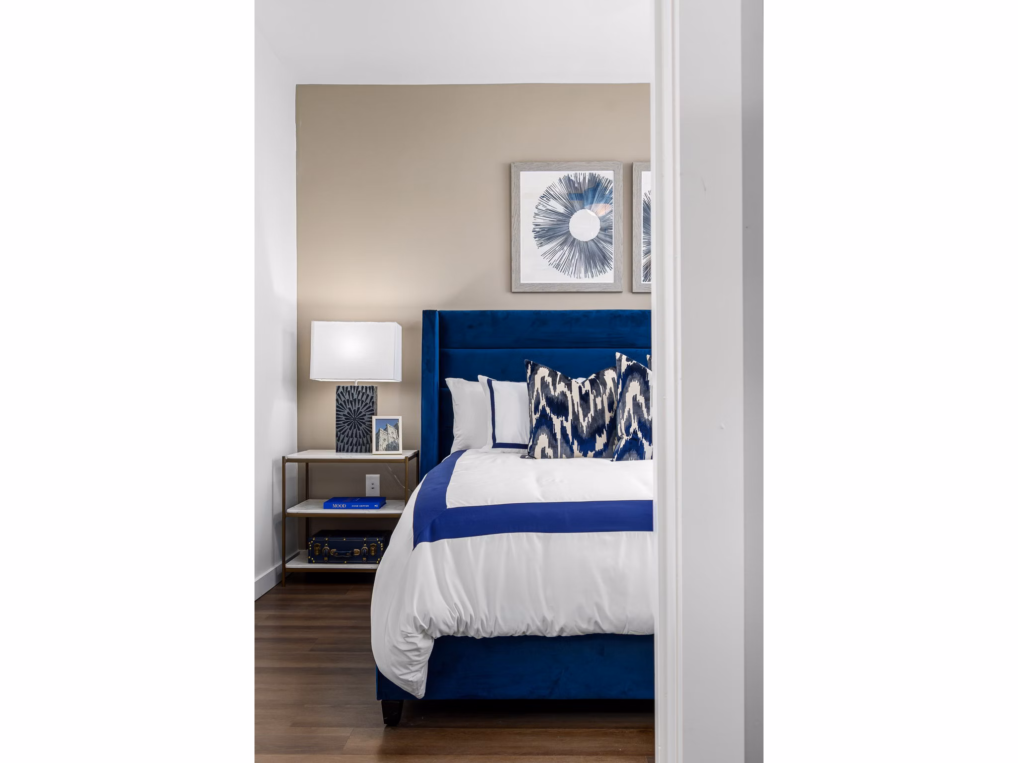 Modern bedroom with city views at The Slater Apartments