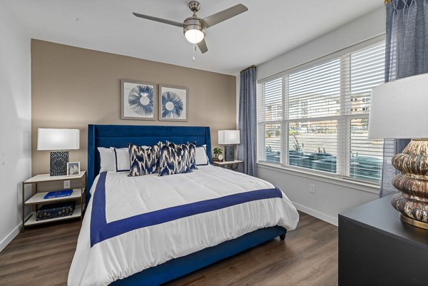 Spacious bedroom featuring modern design elements at The Slater Apartments