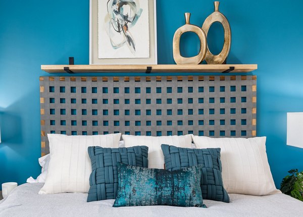 Spacious bedroom with modern decor at The Slater Apartments