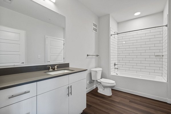 Modern bathroom with sleek fixtures at The Slater Apartments