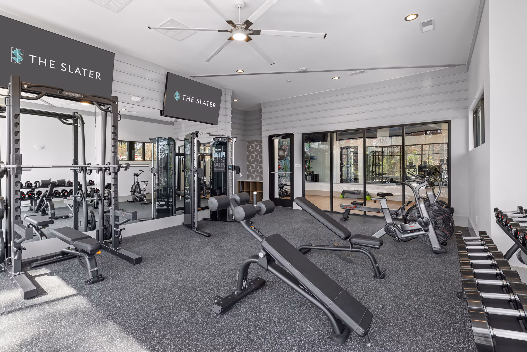 Fitness center with modern equipment at The Slater Apartments for active lifestyle enthusiasts