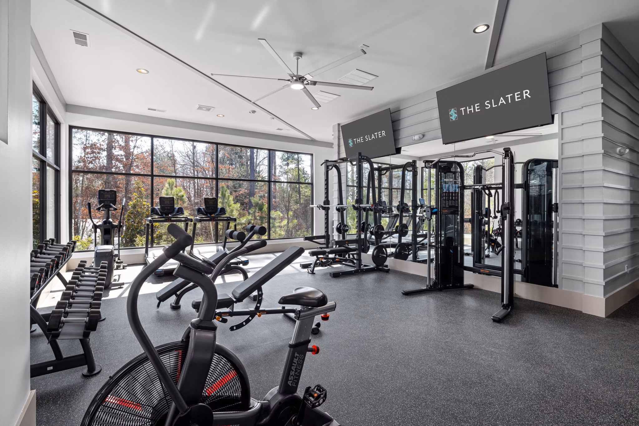 State-of-the-art fitness center with modern equipment at The Slater Apartments