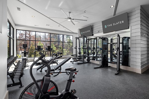 State-of-the-art fitness center with modern equipment at The Slater Apartments