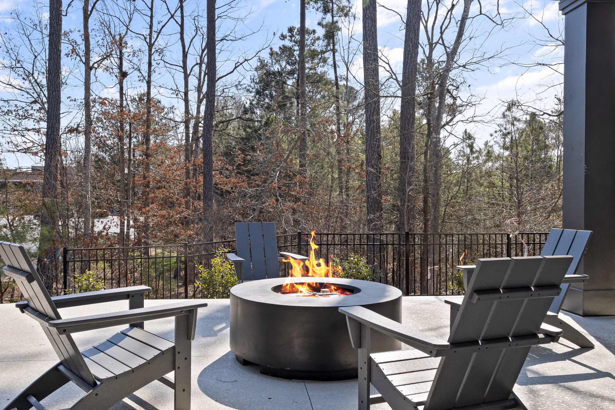 Outdoor fire pit area at The Slater Apartments, perfect for relaxing evenings in the well-designed luxury community