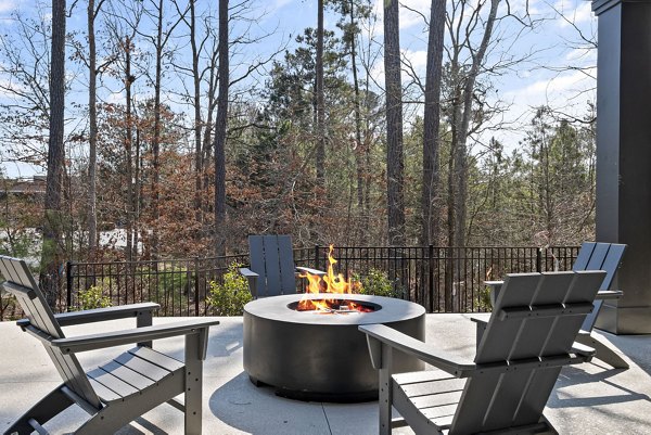 Outdoor fire pit area at The Slater Apartments, perfect for relaxing evenings in the well-designed luxury community