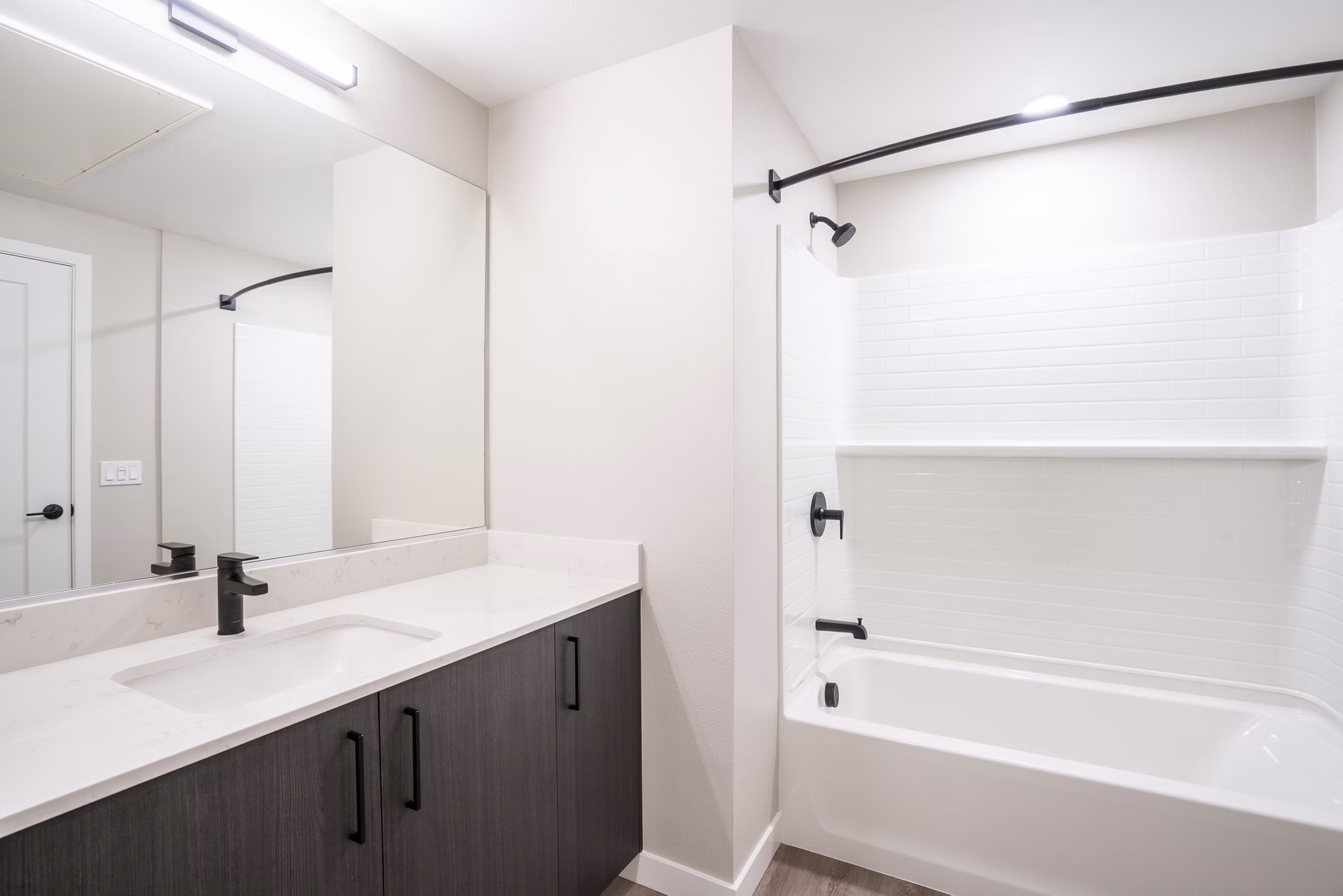Bathroom featuring modern fixtures and stylish tiles at Sofia Apartments in Greystar's luxury community