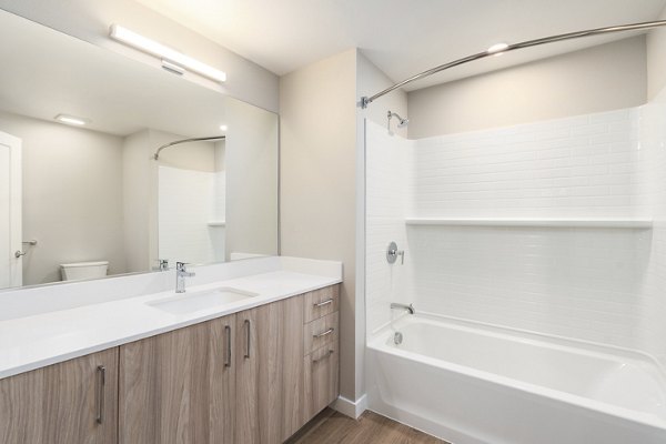 Modern bathroom with elegant fixtures at Sofia Apartments luxury residences
