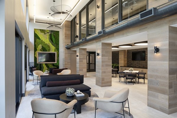Sophisticated clubhouse with modern dÃ©cor at Sofia Apartments, offering luxury amenities for residents