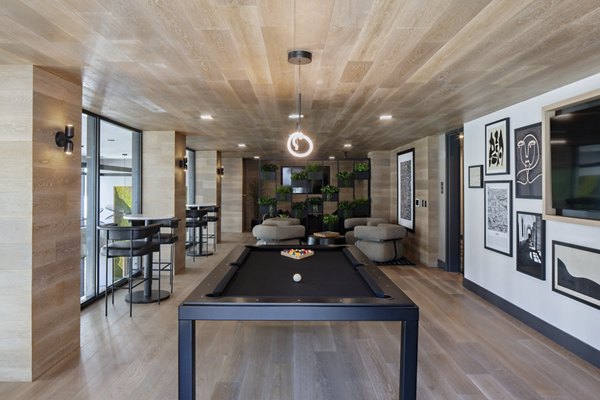 Sofia Apartments: Stylish clubhouse featuring modern seating and decor in a luxury apartment community