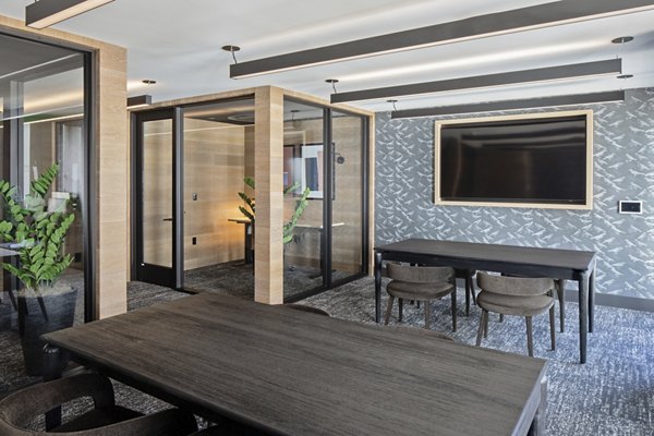 Sophia Apartments: Stylish clubhouse featuring modern decor and seating areas in a vibrant community