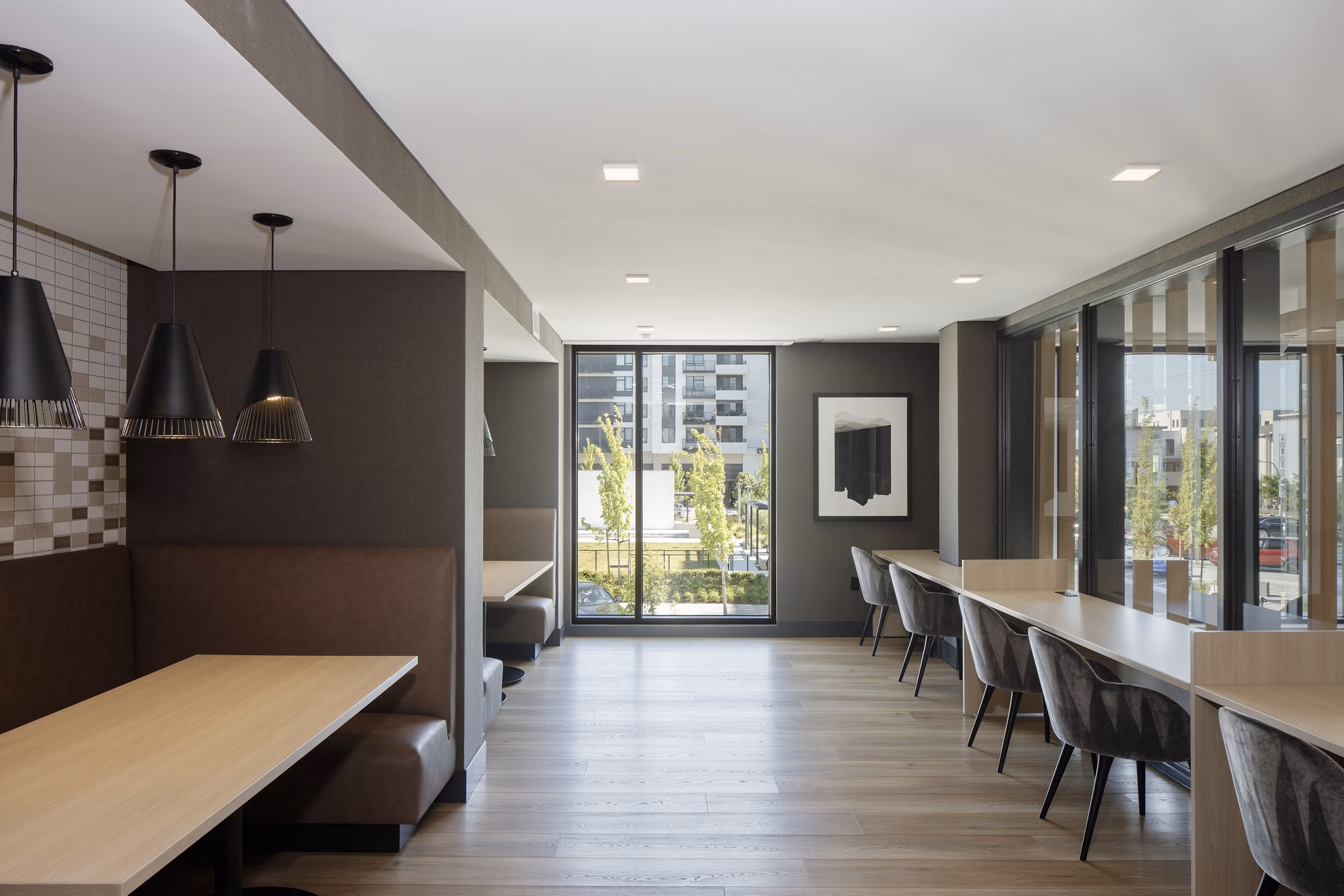 Clubhouse at Sofia Apartments: Modern design clubhouse with comfortable seating and entertainment areas in the heart of the community