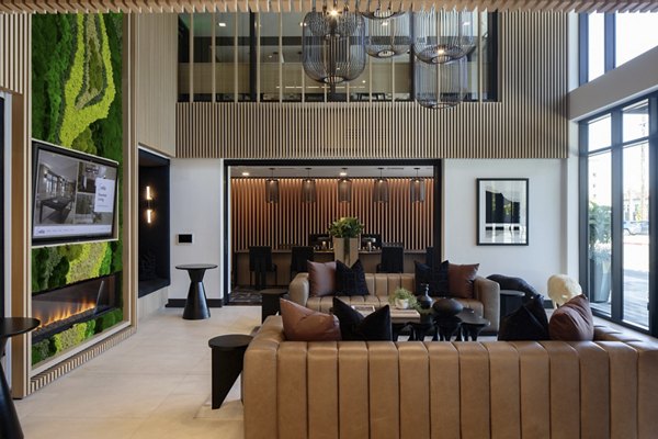 Clubhouse featuring modern design and seating at Sofia Apartments, luxury living spaces by Greystar in the heart of the city