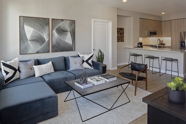 Spacious living room with modern furnishings at Sofia Apartments, Greystar luxury residences