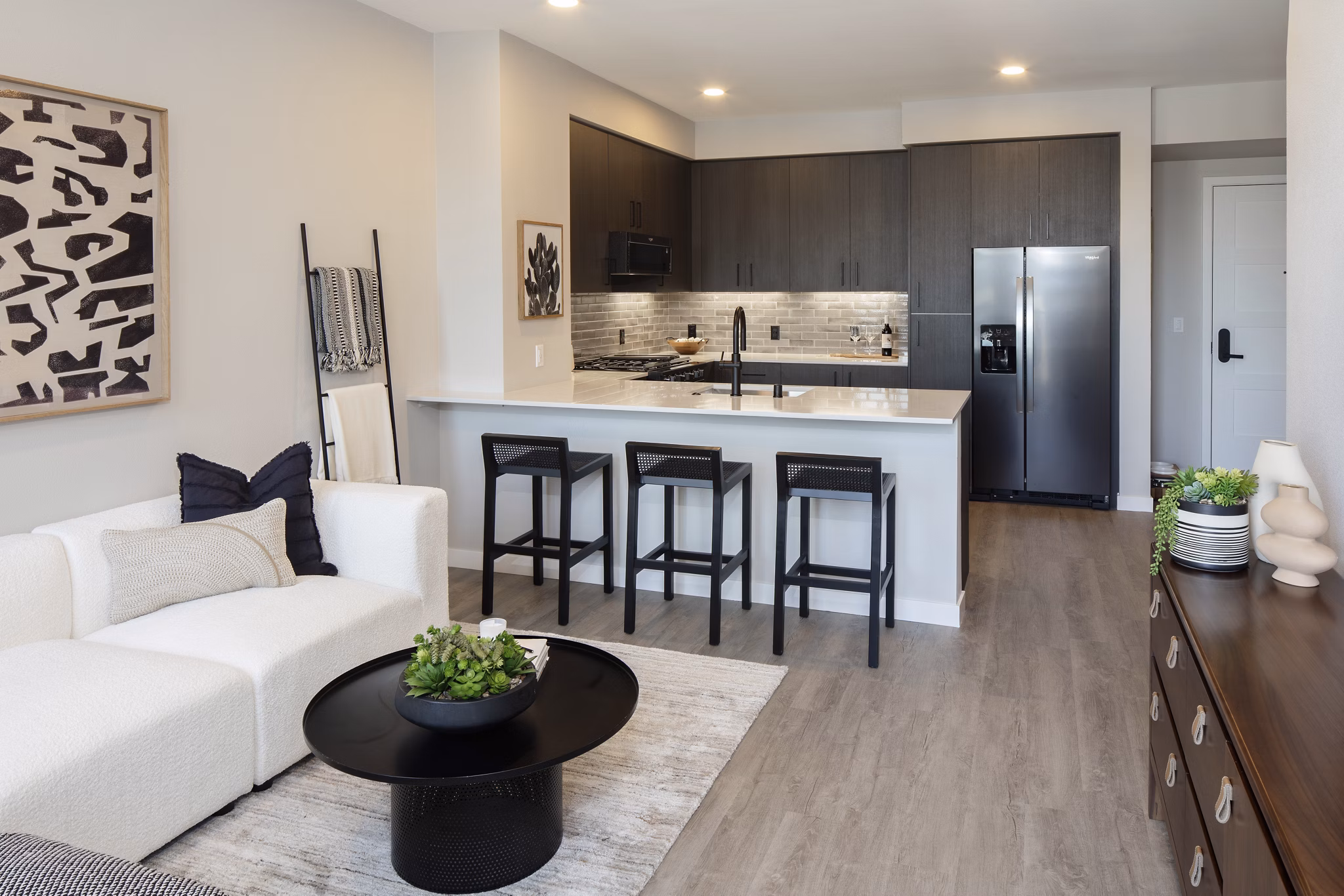 Spacious living room with elegant furnishings at Sofia Apartments