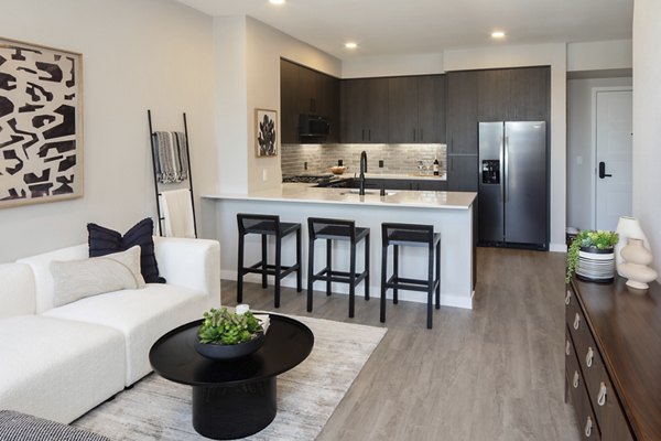 Spacious living room with elegant furnishings at Sofia Apartments