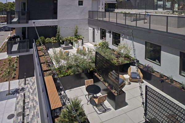 Rooftop deck with city views at Sofia Apartments