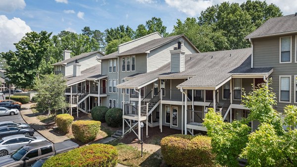Shadowood Apartments: Luxury apartment building with landscaped gardens in vibrant neighborhood