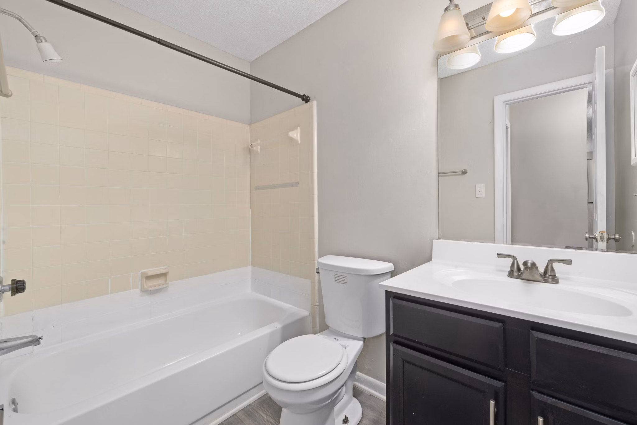 Modern bathroom with sleek fixtures in Sunstone Apartments