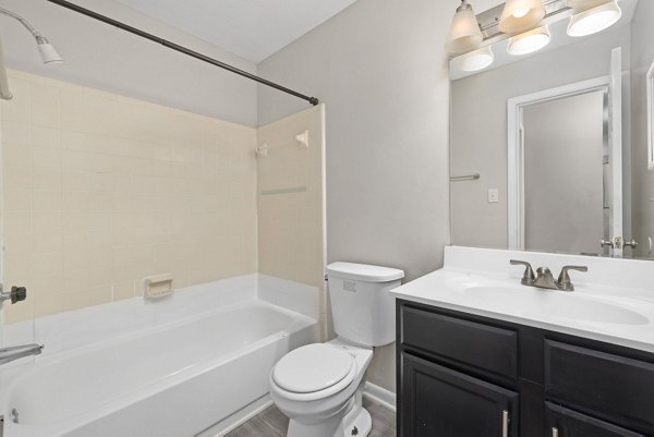 Modern bathroom with sleek fixtures in Sunstone Apartments