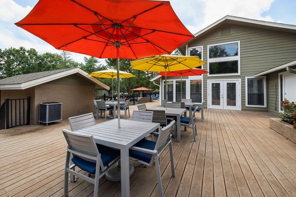 Clubhouse with modern decor and lounge seating at Sunstone Apartments, offering luxury living amenities