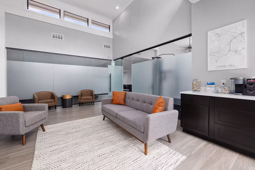 Clubhouse at Sunstone Apartments: Chic communal space with seating areas and modern decor designed for resident gatherings