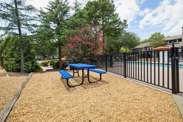 Colorful outdoor playground equipment at Sunstone Apartments, a Greystar luxury community