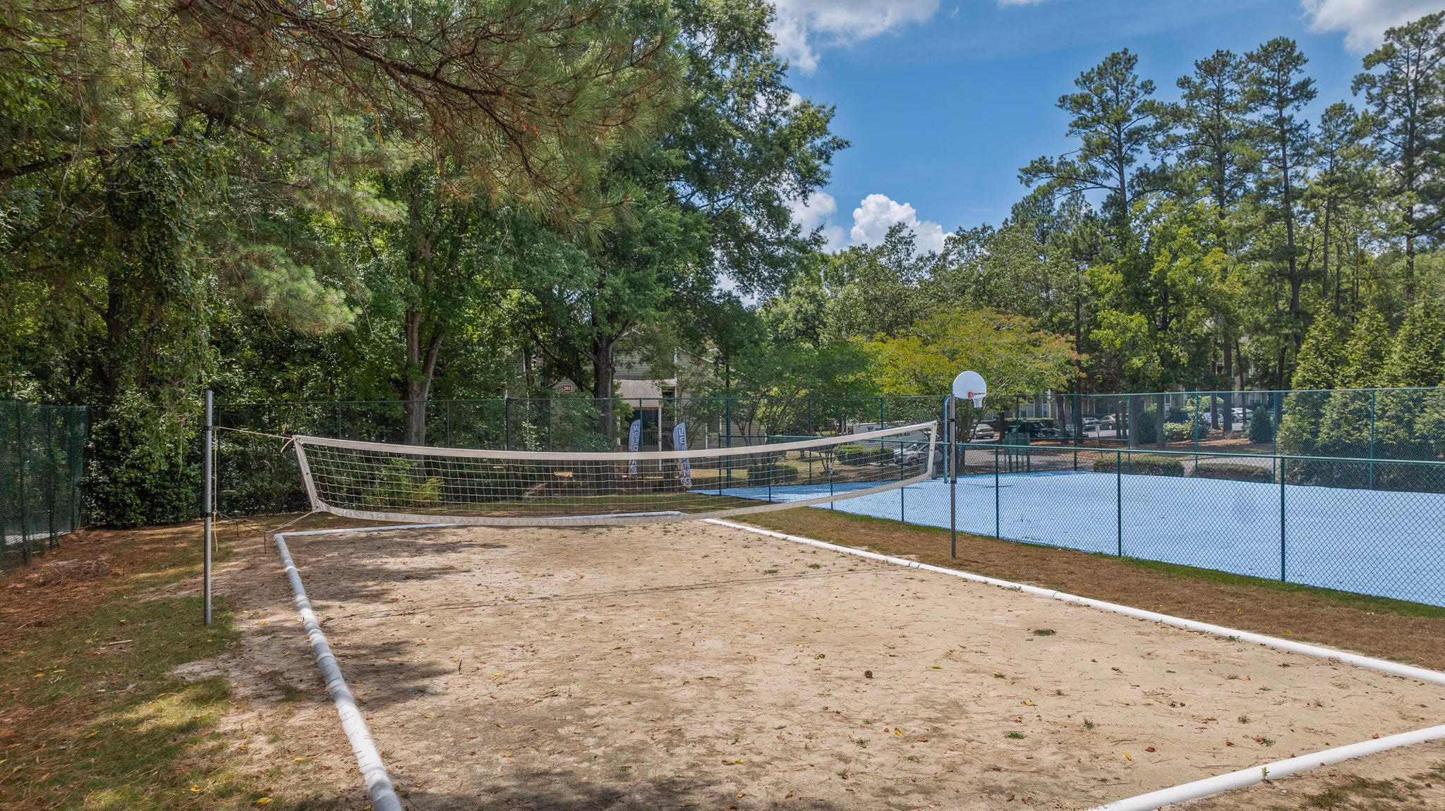 Outdoor sport court at Sunstone Apartments offering recreational activities for residents in a community setting