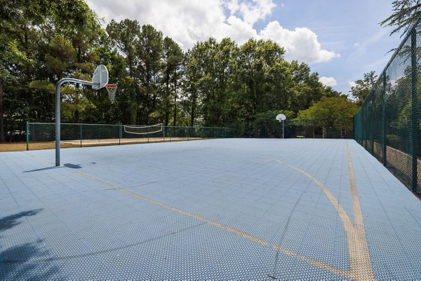 Sport court at Sunstone Apartments offering tennis and basketball facilities