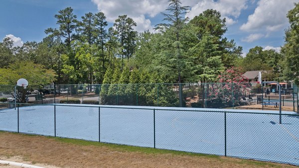 Sport court for basketball and tennis at Sunstone Apartments, featuring well-maintained facilities for active lifestyles