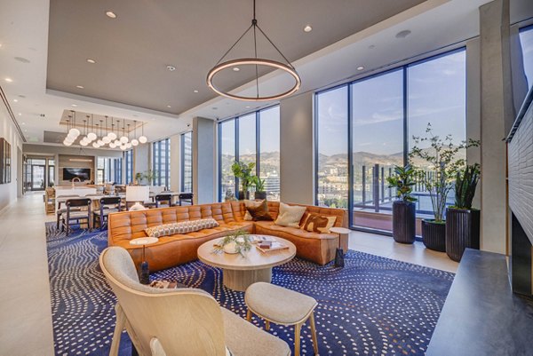 Clubhouse featuring modern decor and communal seating at The Worthington luxury apartments, perfect for social gatherings and events