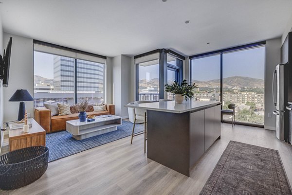 Modern kitchen with stainless steel appliances in The Worthington Apartments